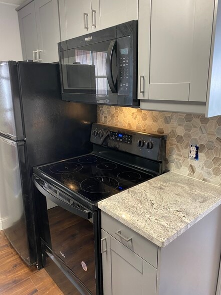 Glass top stove - 2529 Broad Blvd