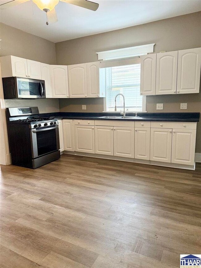Building Photo - Renovated 3-Bedroom Home Steps from the 12...