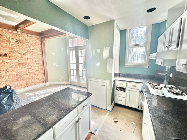 Building Photo - RENOVATION PREVIEW - Astonishing Adams Mor...