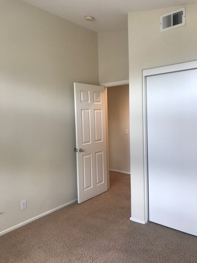 Building Photo - Located on a cul-de-sac, within the gated ...