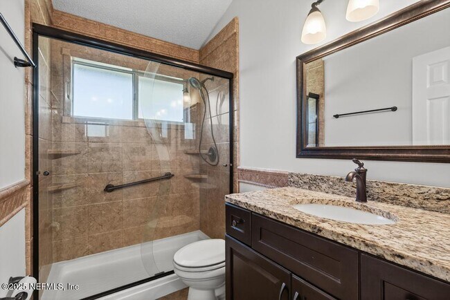 Building Photo - 4851 Jaybird Cir N