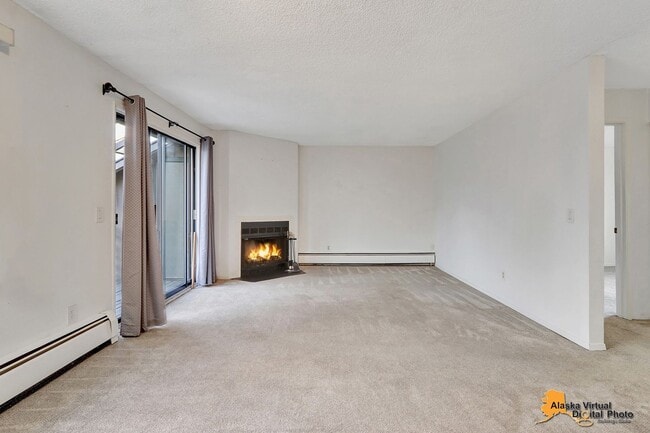 Building Photo - Top Floor End Unit Condo* Pet Friendly, Pr...