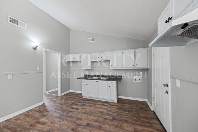 Building Photo - A Must See/ High Vaulted ceiling's & Section 8 Welcome!!!