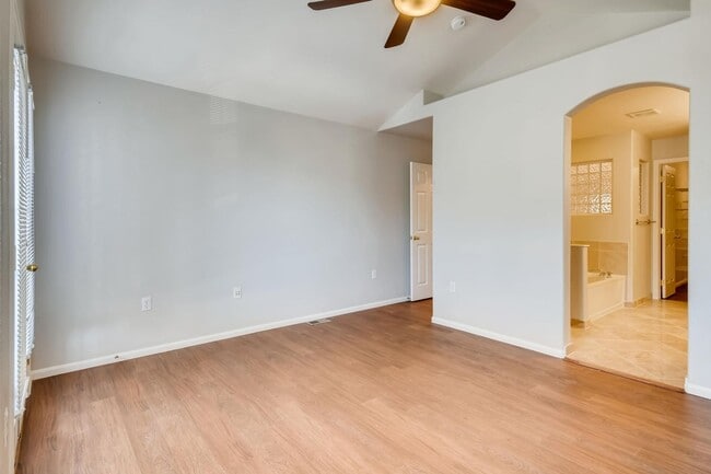 Building Photo - Stunning 3-bed 3-bath townhome that features hardwood floors and an attached 2-car garage!