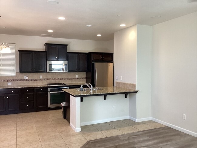 Building Photo - 7009 Harmony Dr