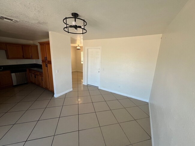 Building Photo - Move-In Ready Beauty with Granite Kitchen, Stainless Steel Appliances & Expansive Backyard