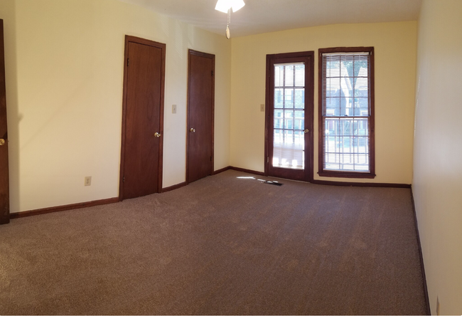 Primary bedroom includes a large walk-in closet - 114 Colonial Ct