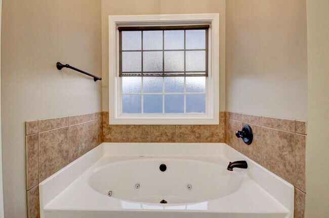 Building Photo - Stunning Brick Front Home With Fireplace A...