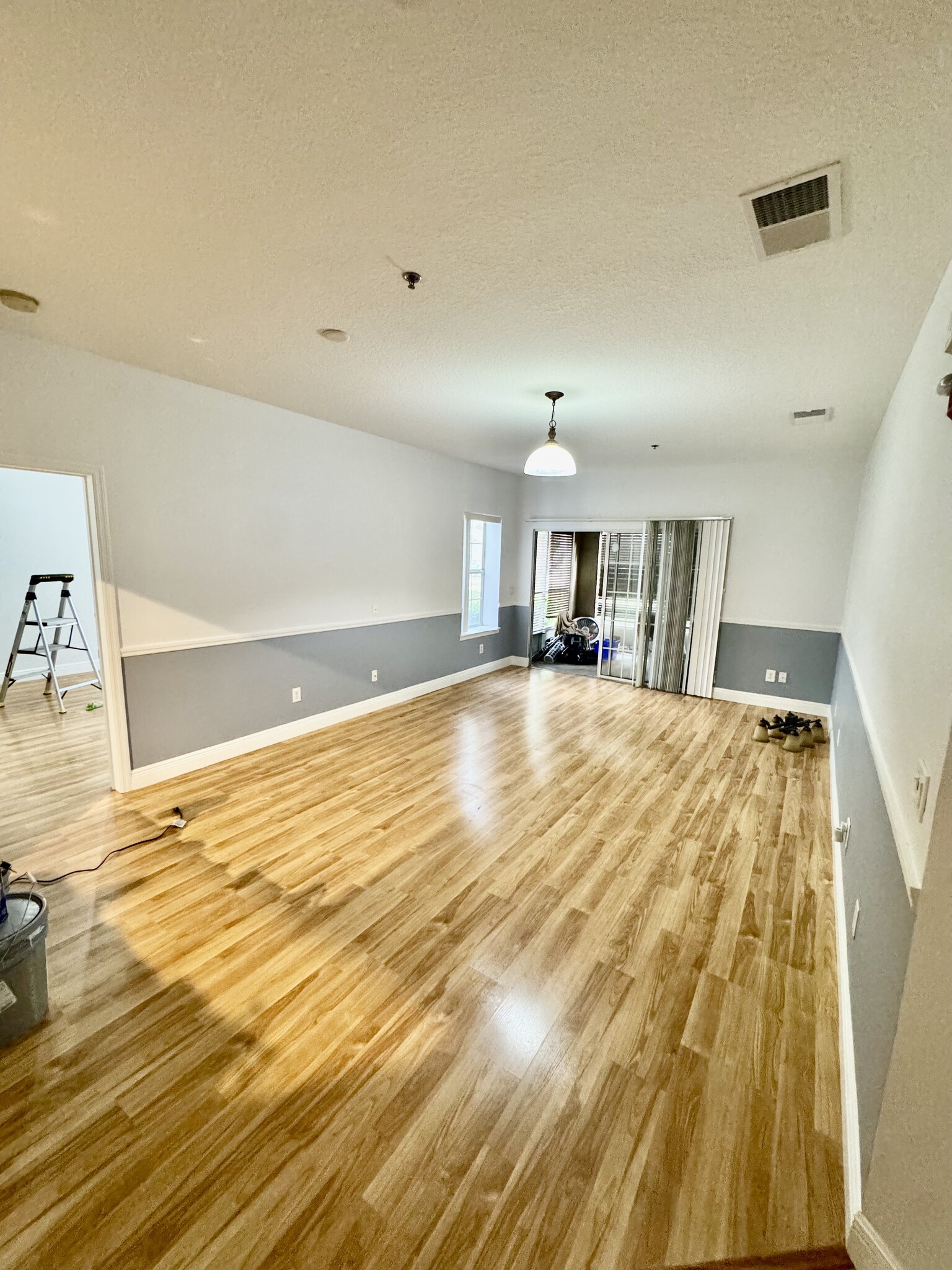 Living room with patio view - 4833 Cypress Woods Dr