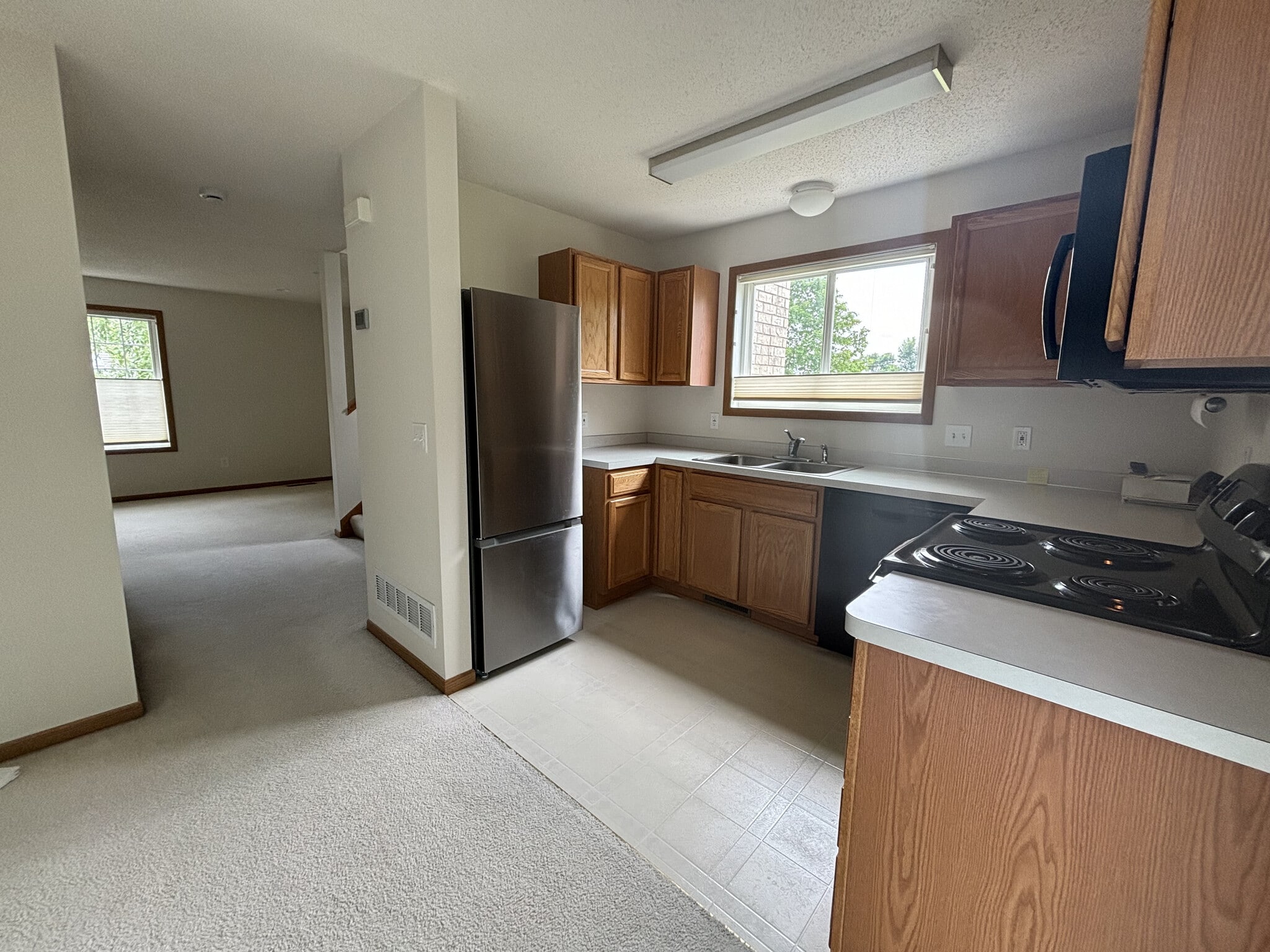 second angle of dining room and kitchen - 7792 Village Pl
