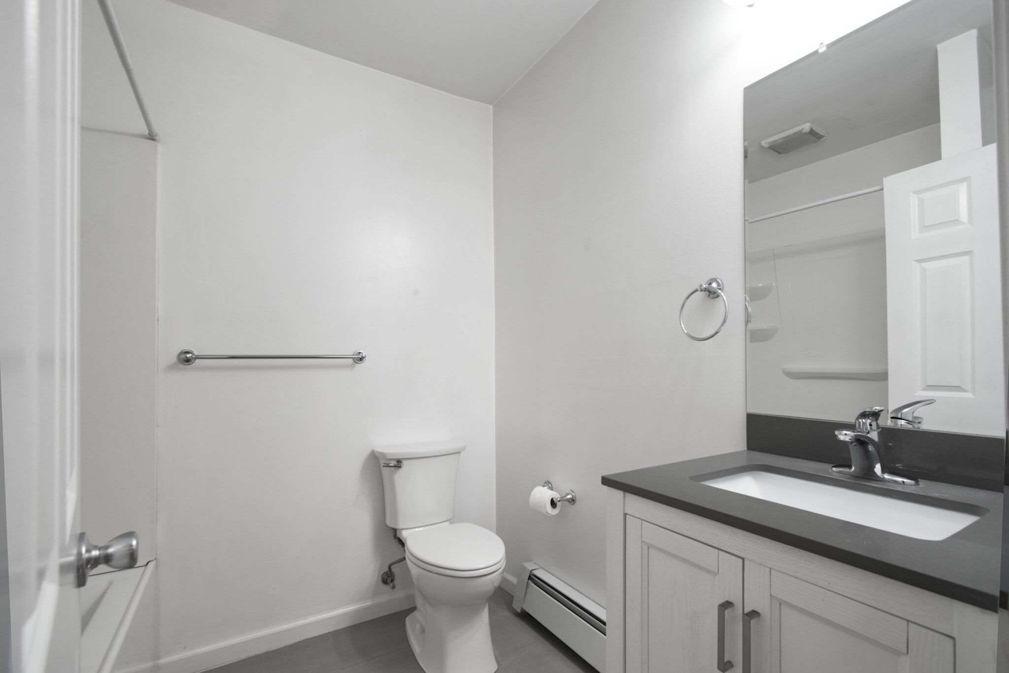 Bathroom with 24” Natural Stone & Hardwood Vanity - 30 Cooper St