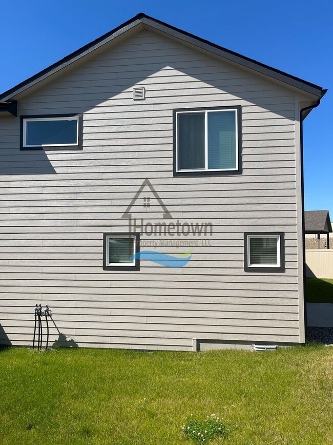 Building Photo - Woodbridge South Home with 4 Bedrooms and 3 Bathrooms in Post Falls build in 2021!