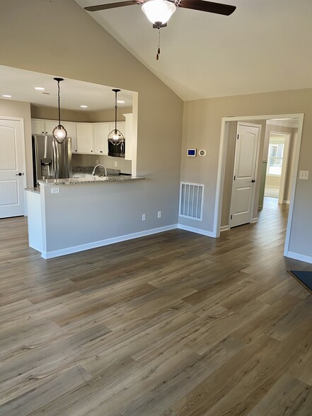 Living Area open to Kitchen - 3026 Farmhouse Dr