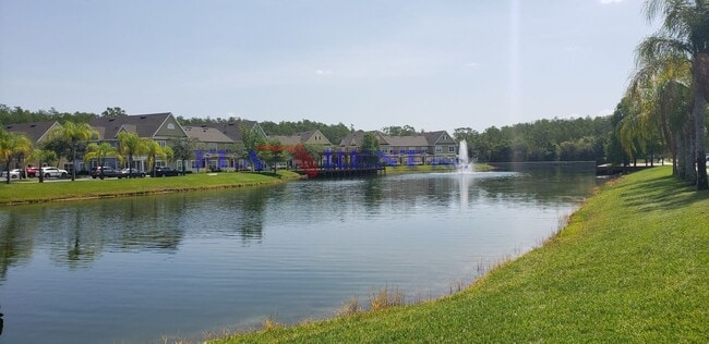 Building Photo - 4 BR / 3 FULL BATH (INCLUDES 2 MASTERS) 2 STORY (NEAR DISNEY!) GATED COMMUNITY WITH COMMUNITY POO...