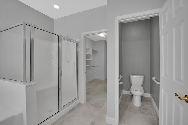 Building Photo - Spacious 4-bedroom, 3-car garage home feat...