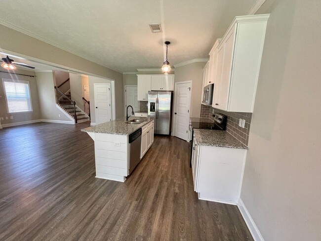 Building Photo - Whispering Pines 4 Bedroom 3.5 Bathroom Re...