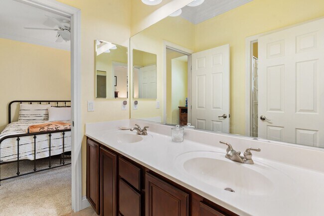 Building Photo - Spacious Mountain’s Edge Home with Den, Sunroom, 3-Car Garage & Private Spa Retreat