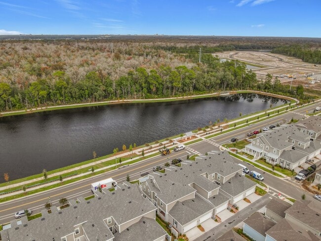 Building Photo - New Luxury Townhome in Celebration, FL Corner unit.  All porcelain tiled floors.  Aleutian model ...