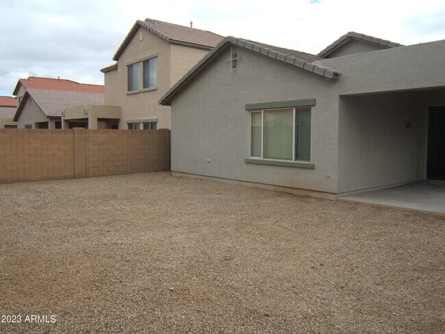 Building Photo - 9238 W Milkweed Loop