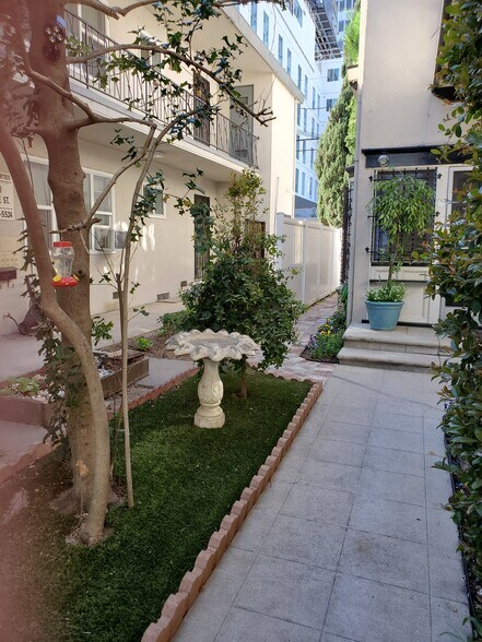 FEEDER AND BIRD BATH - 6326 Orange St