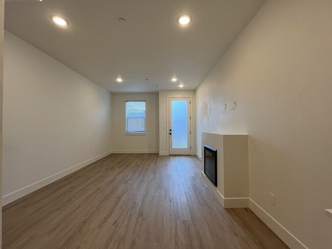 Building Photo - Modern 2-Bed, 1.5-Bath Condo with Custom Kitchen, Private Patio, and Prime Location
