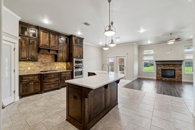 Building Photo - Upscale Comfort Meets Everyday Functionality in This Stunning 3-Car Garage Home!