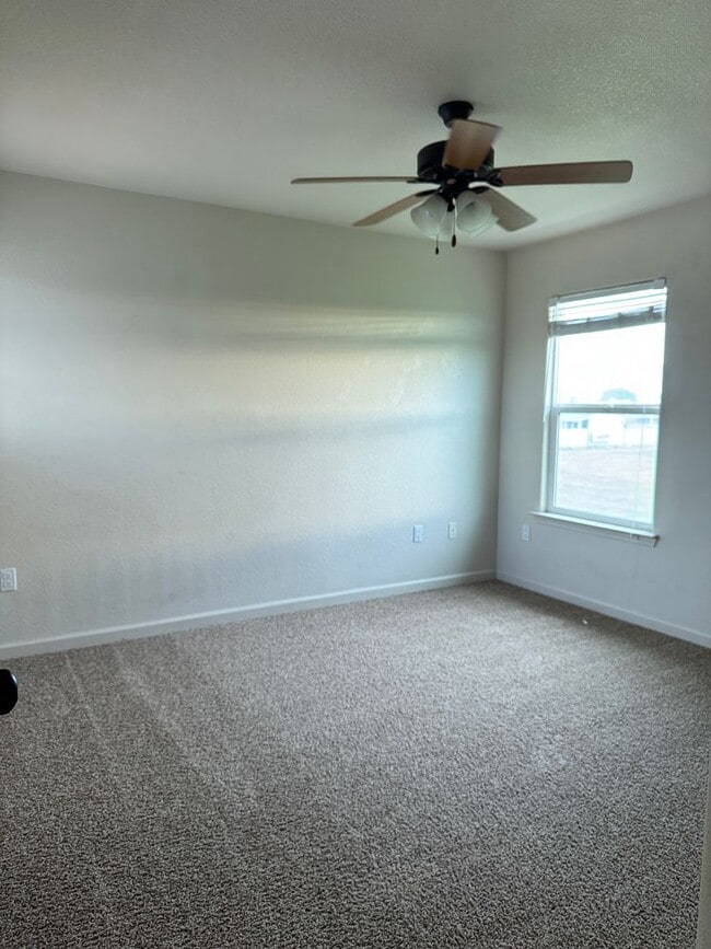 Building Photo - NOW AVAILABLE!! BEAUTIFUL GUSTINE HOME LOCATED IN GATED COMMUNITY