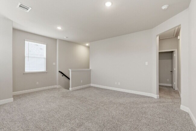 Building Photo - "Open-Concept 4-Bedroom, 2.5-Bath with Designer Finishes and Peaceful Greenbelt Views!"