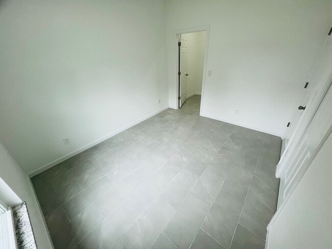 Building Photo - BRAND NEW CONSTRUCTION- ONE OF A KIND-ONE BEDROOM, ONE BATH-ONE CAR GARAGE- LEHIGH ACRES