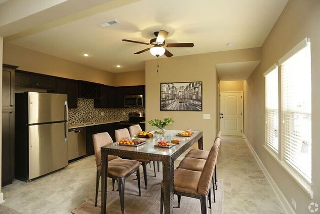 Building Photo - Eagle Creek Townhomes - Exterior Townhome - Your New Home Comes with Big Monthly Savings