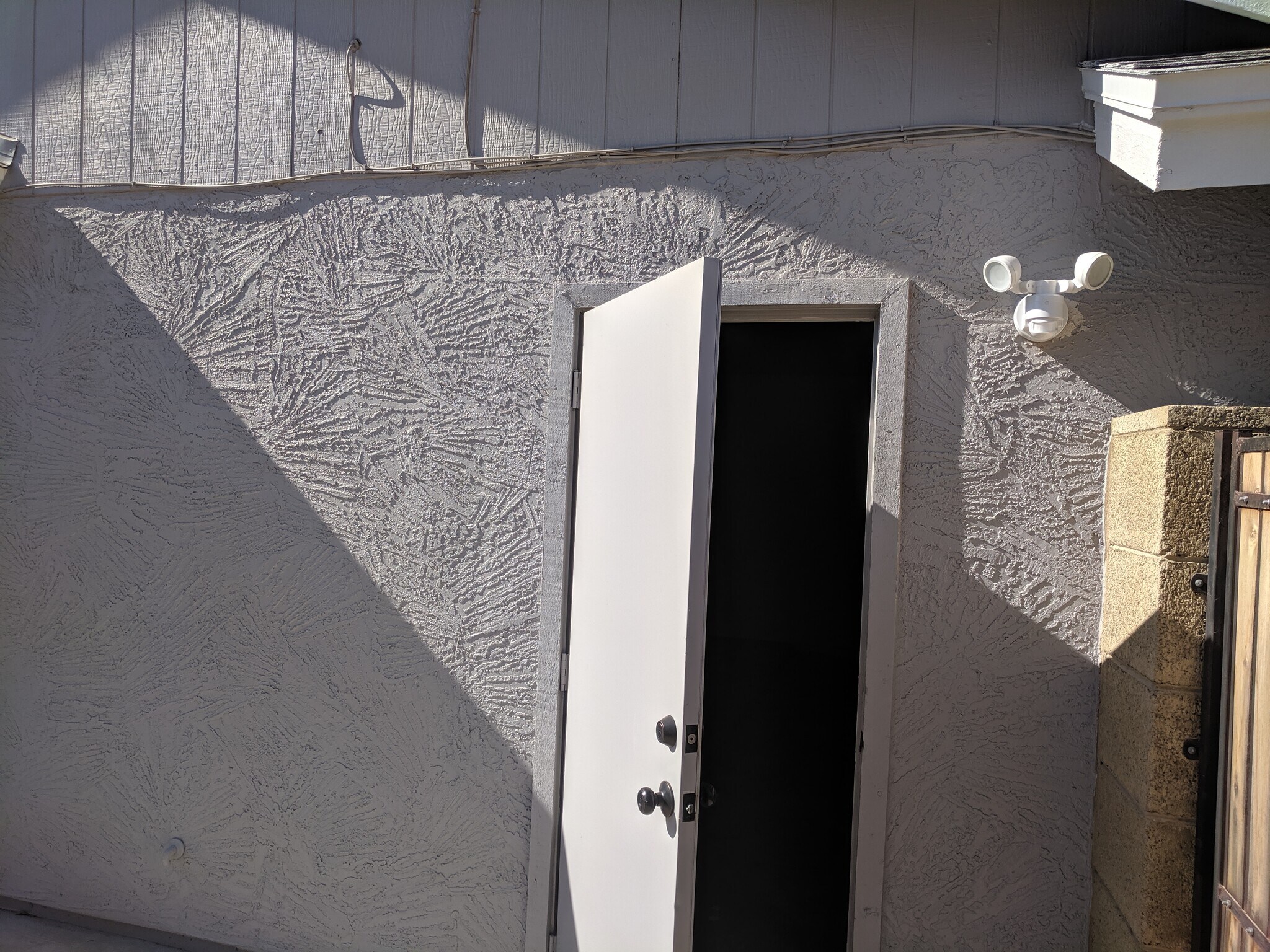exterior garage door with security light - 14101 N 78th Dr