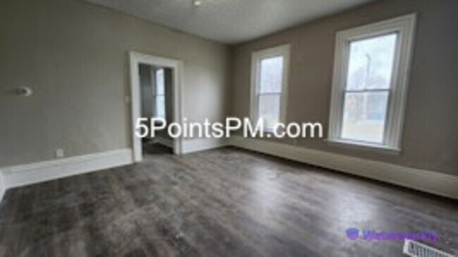 Building Photo - 9804 Miles Ave