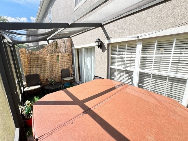Building Photo - Fully Furnished 5-Bed End-Unit Townhome with Hot Tub in Gated Coral Cay! WASHER & DRYER INCLUDED!