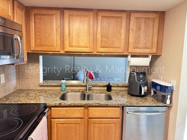 Building Photo - 10001 E Evans Ave