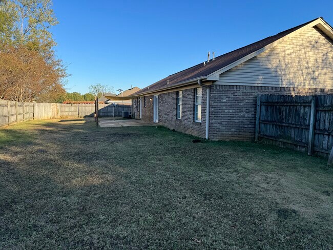 Back yard with large patio - 3550 Woodland Dr