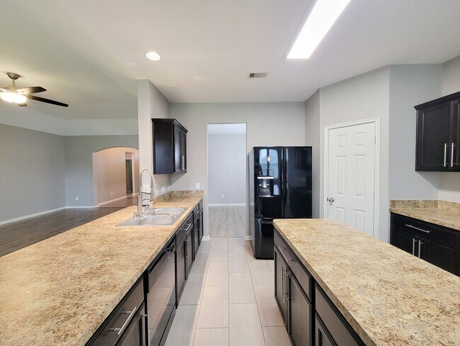 Building Photo - Welcome to this charming one-story home fe...