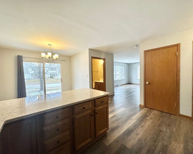 Building Photo - Charming Pewaukee Townhome with Modern Touches and Ample Space