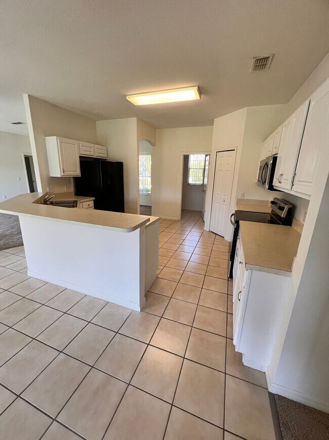 Building Photo - 4/2 in Bellalago with no rear neighbor
