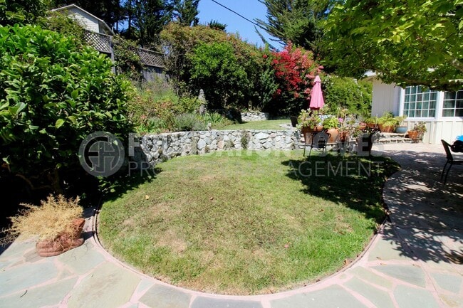Building Photo - FURNISHED - Enjoy this little piece of par...