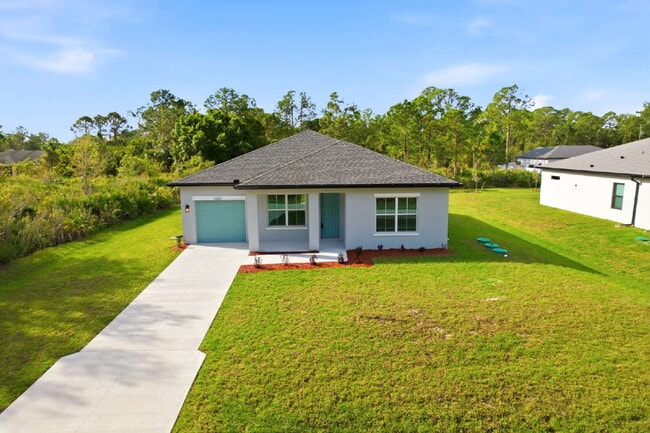 Building Photo - Brand New 4-Bedroom Gem with 2 Full Baths on Large Lot in Lehigh Acres – A Perfect Family Haven!