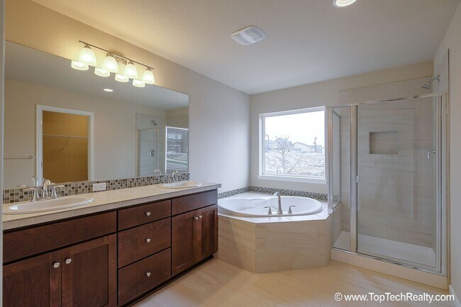 Building Photo - Spacious 4-Bedroom + Office Home in Abbey Creek – Modern Finishes, EV Charger & Low-Maintenance B...