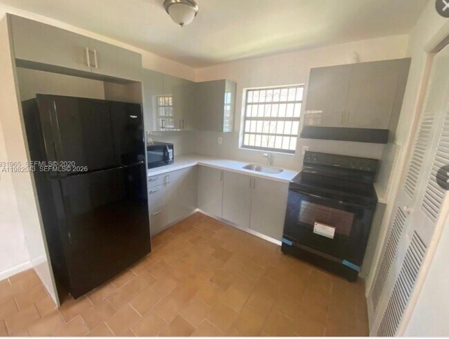 Building Photo - 6747 NW 5th Ct