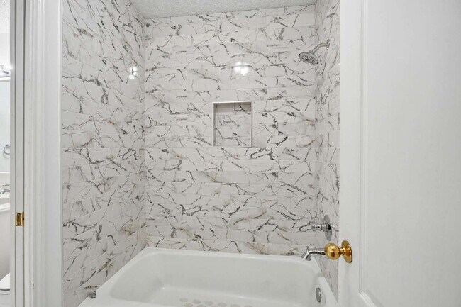 Building Photo - Top-Tier Luxury Living at 98th & Quaker | Kings Gate