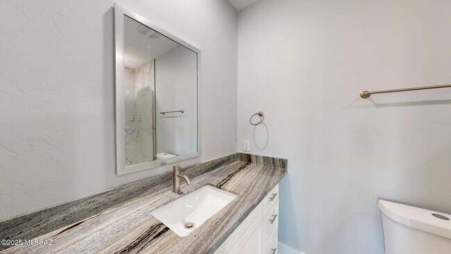 Building Photo - 7095 W Los Reales Rd