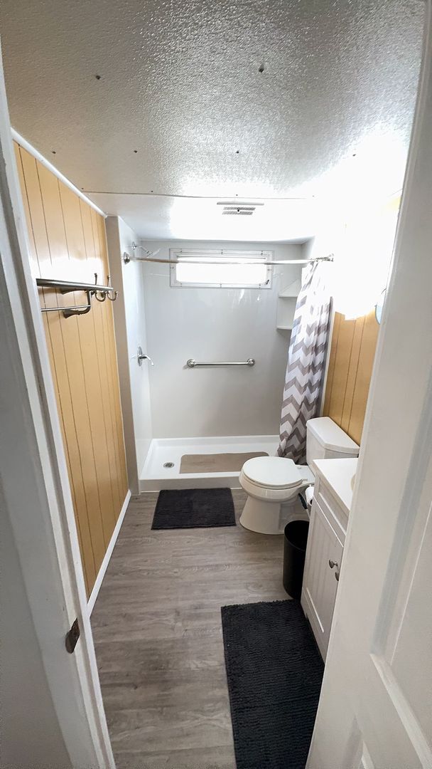 Building Photo - Beautiful fully furnished one bedroom, one bath manufactured home in a 55+ deed restricted gated ...