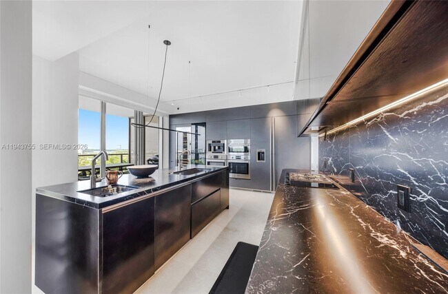 Building Photo - 9705 Collins Ave