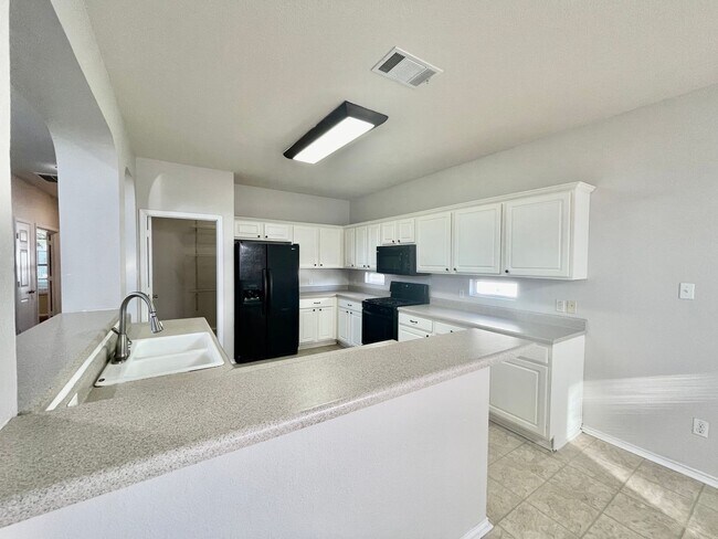 Building Photo - Spacious Home with Multiple Outdoor Living...