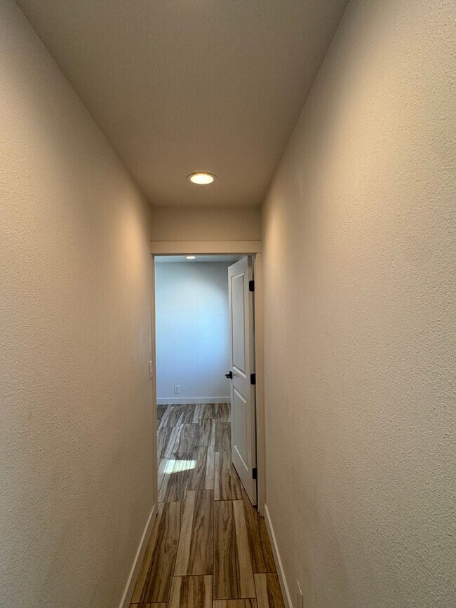 Building Photo - !! MOVE-IN SPECIAL !! Cozy Carson Back House with Skylights & Washer/Dryer