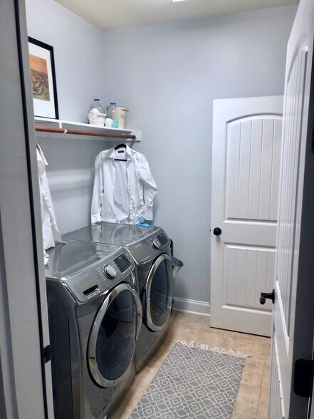 Laundry room, downstairs - 1359 Micahs Way N