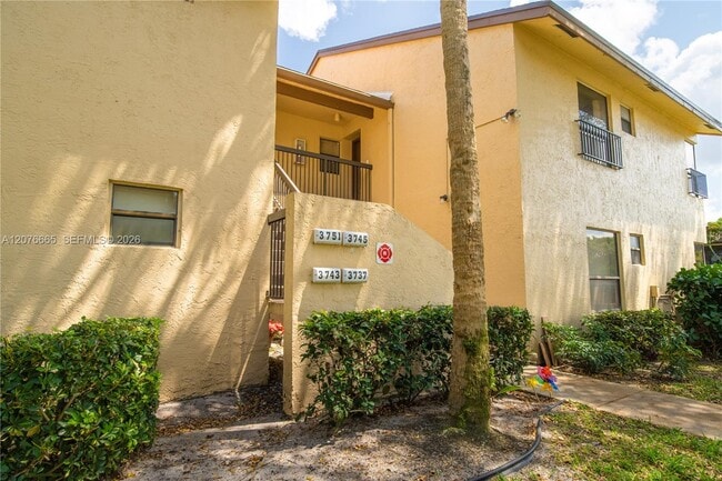 Building Photo - 3745 Cocoplum Cir